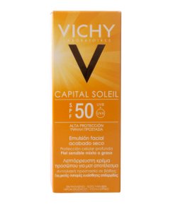 Crème solaire Vichy Capital Soleil SPF 50 posée sur une serviette de plage sous le soleil.