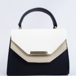 Sac à main noir en cuir synthétique