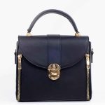 Sac a main noir fermoir doré